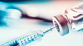 vaccine and syringe
